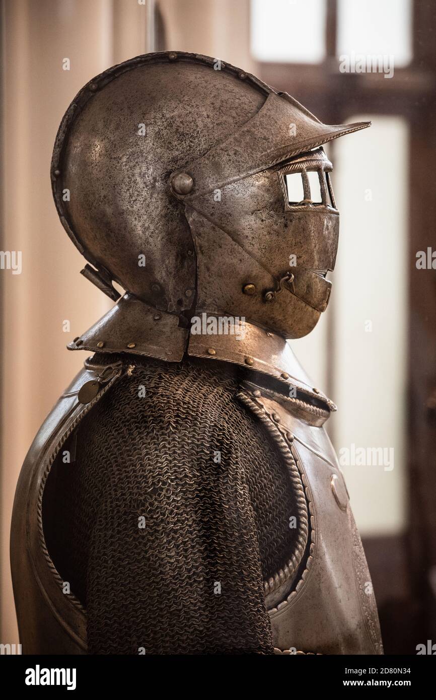 Plate armour medieval armor, armed fighter profile. Historical type of personal body armour made from bronze, iron or steel. Stock Photo