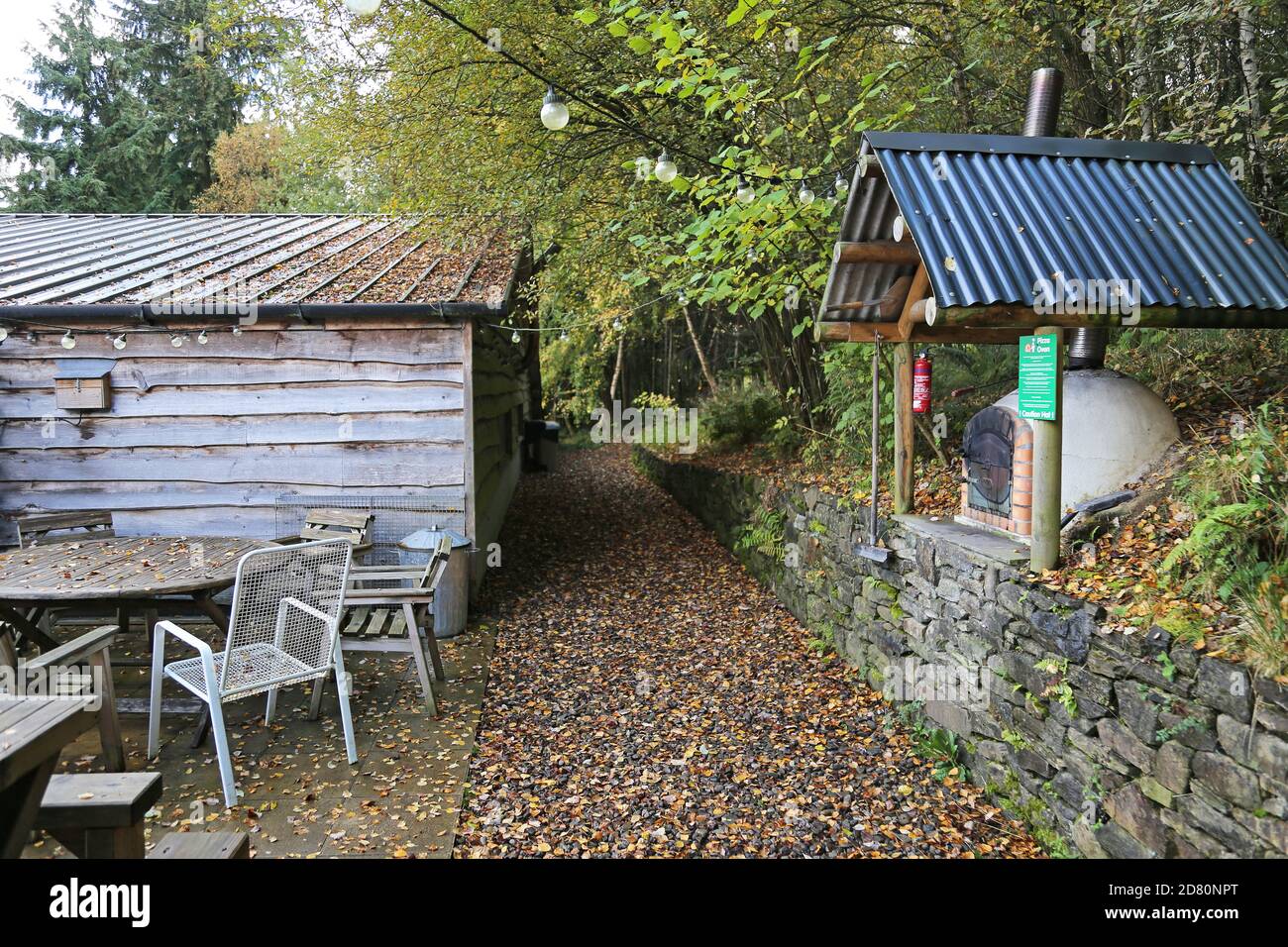 Pizza oven and communal eating area, Celtic Woodland Holidays, Road Wood, Builth Wells, Brecknockshire, Powys, Wales, Great Britain, UK, Europe Stock Photo