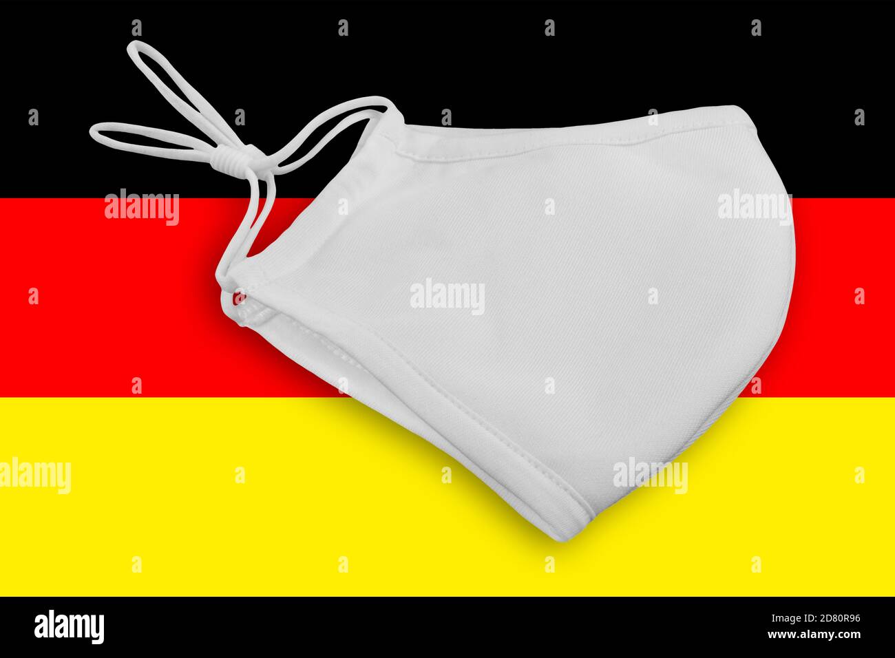 Protective Face Mask KN 95 and German Flag Background Stock Photo