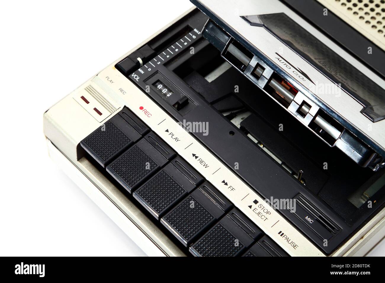 Old vintage portable cassette player from the 1980s isolated on a white