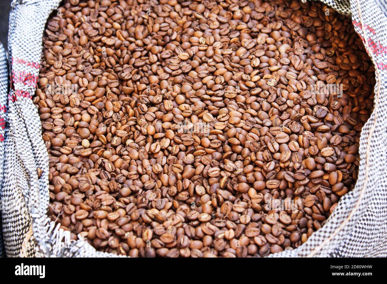 Raw coffee beans in sacks, coffee shop in Athens, Greece Stock Photo