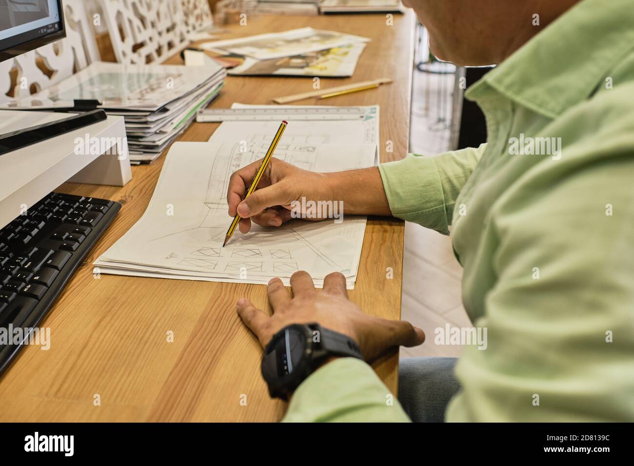 designer is drawing his projects Stock Photo