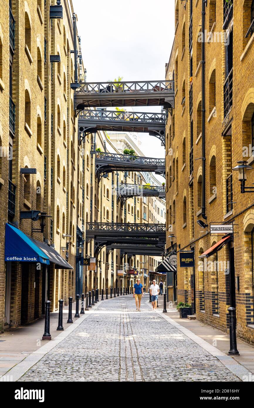 Warehouses and walkways on the historic riverside street Shad Thames, London Bridge, London, UK Stock Photo