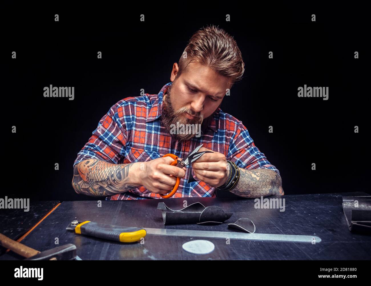 Leather man makes quality products Stock Photo