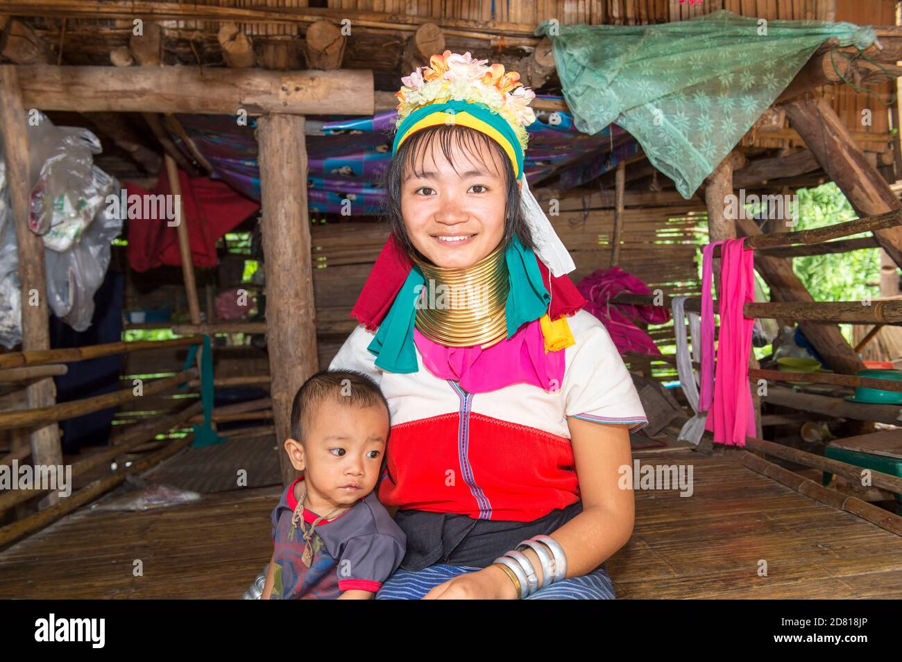 Long-necked woman with her baby, Karen tribe, Chiang Mai, Thailand Stock Photo