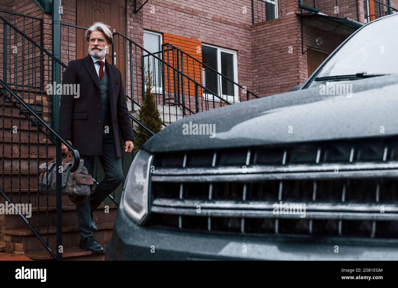 Rich man car bag hi-res stock photography and images - Alamy