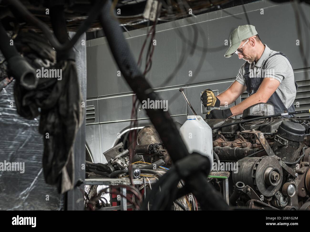 Caucasian Automotive Technician Wearing Eyes Safety Glasses Repairs
