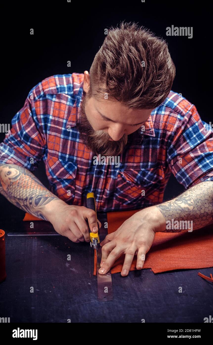 Artisan being keen on his buisness Stock Photo