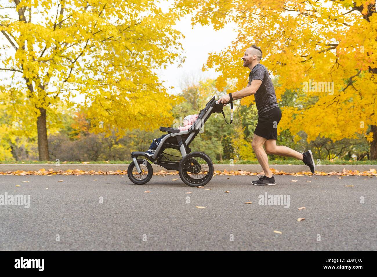 yellow jogging stroller