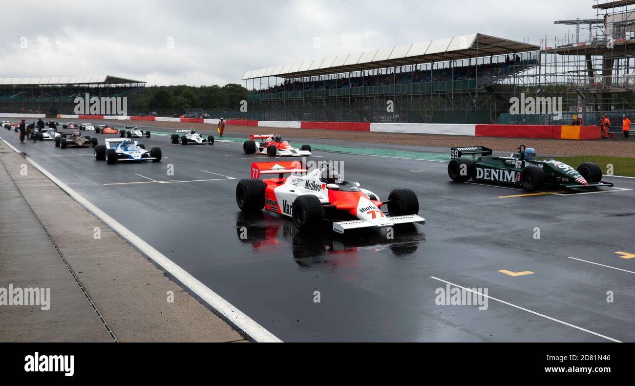 Cars lined up on the grid, for the start of the Sir Jackie Stewart FIA Masters Historic Formula One Race, at the 2019 Silverstone Classic Stock Photo