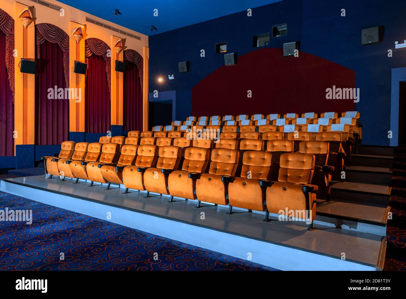 Large cinema theater interior with seat rows for audience to sit in movie theater premiere by