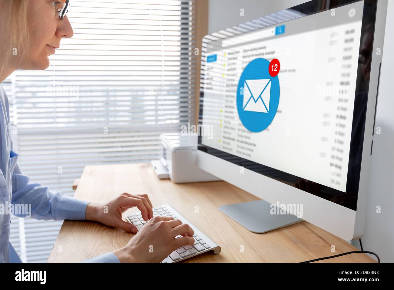 Email inbox notification with female business person receiving new incoming message at work, e-mail communication marketing  and interruption concept, Stock Photo