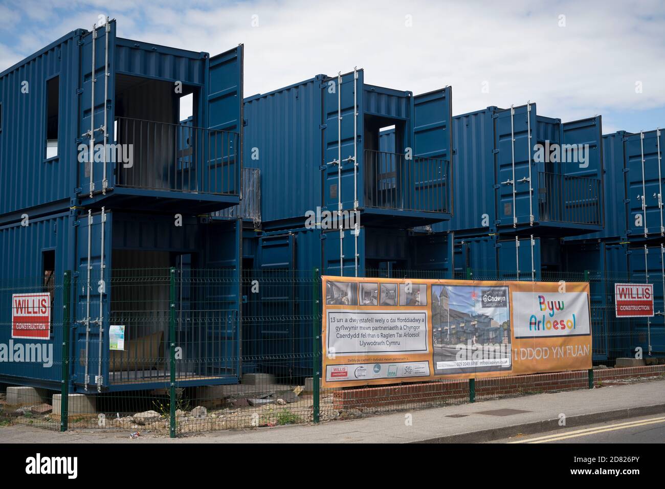 Shipping containers used to house the homeless on Bute Street in Cardiff, Wales, United Kingdom. Stock Photo