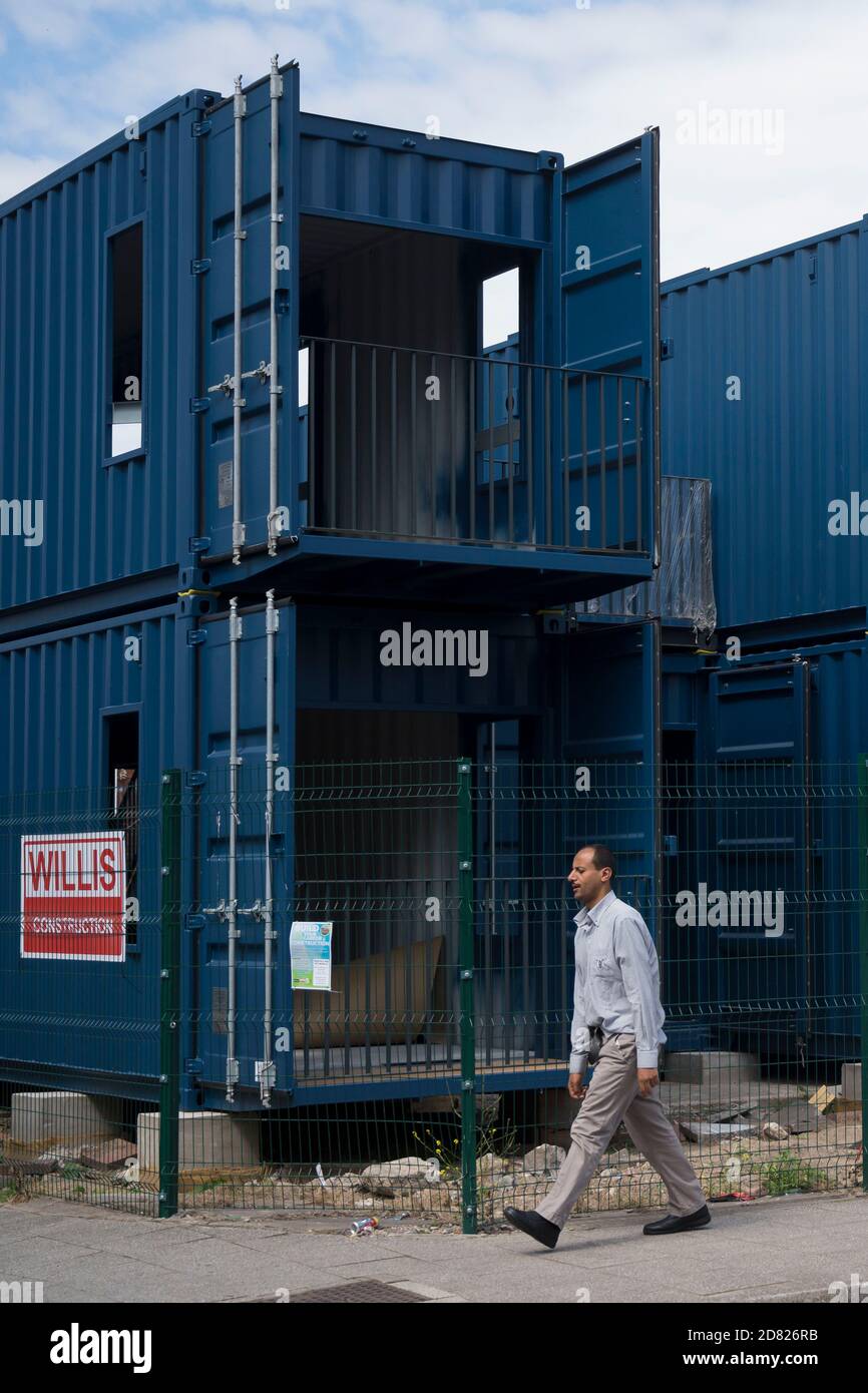 Shipping container housing for homeless hires stock photography and