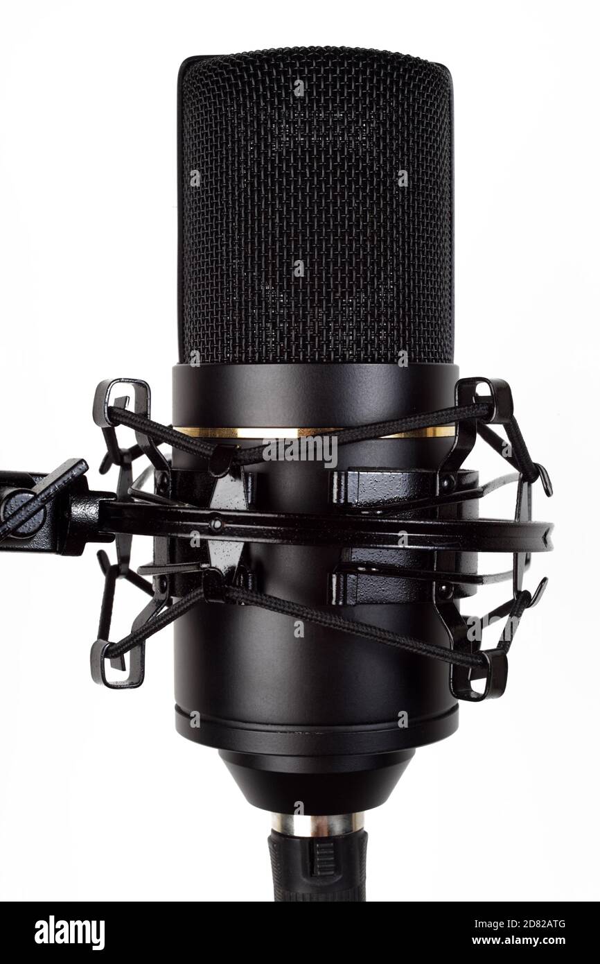 Studio condenser microphone on a microphone stand, close-up. Isolate on ...