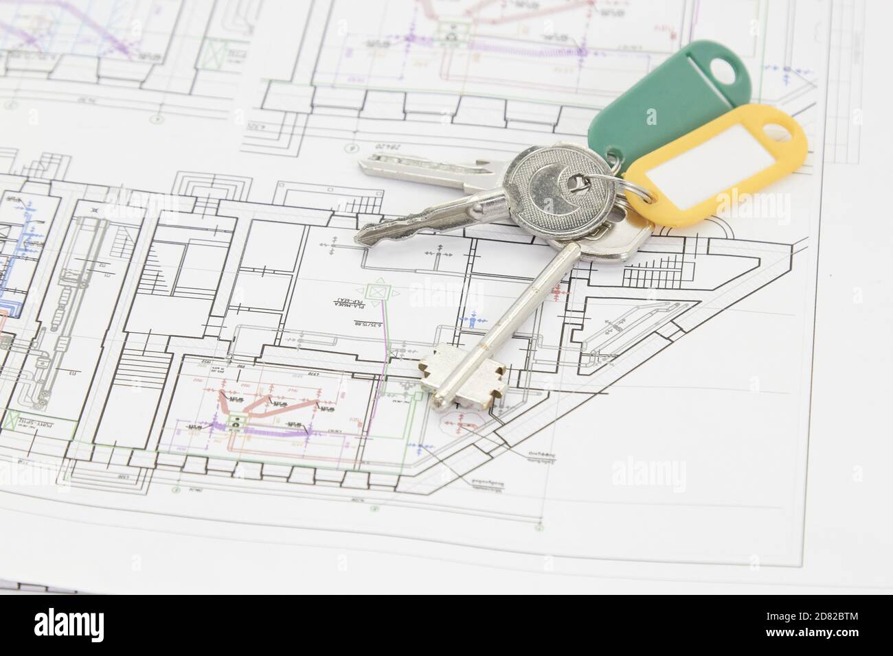 design modeling of housing a set of keys to the house on the architectural project of the house. Stock Photo