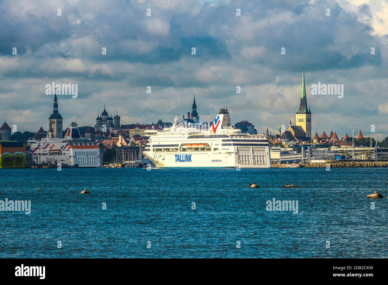 ESTONIA, TALLIN, Ferry entering the harbor of Tallin with historic town in background Stock Photo