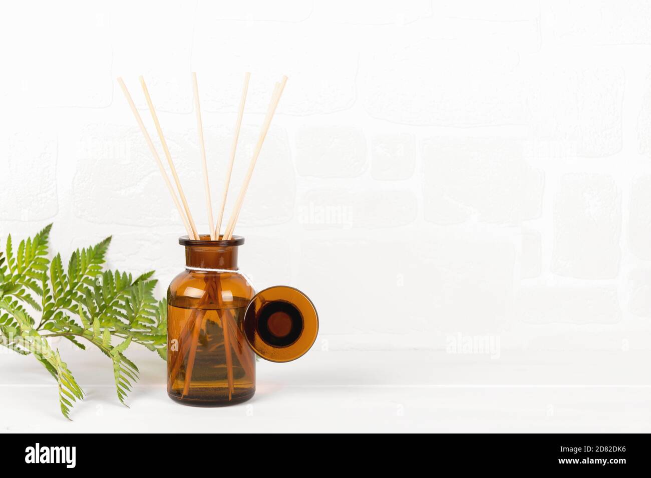 Download Air Refresher Bottle Mock Up Reed Diffuser On A White Background With Fern Leaf Stock Photo Alamy