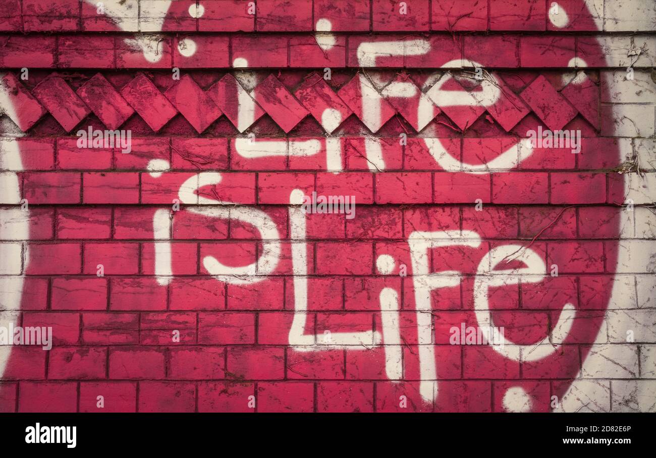 graffiti on a historic urban wall Stock Photo Alamy