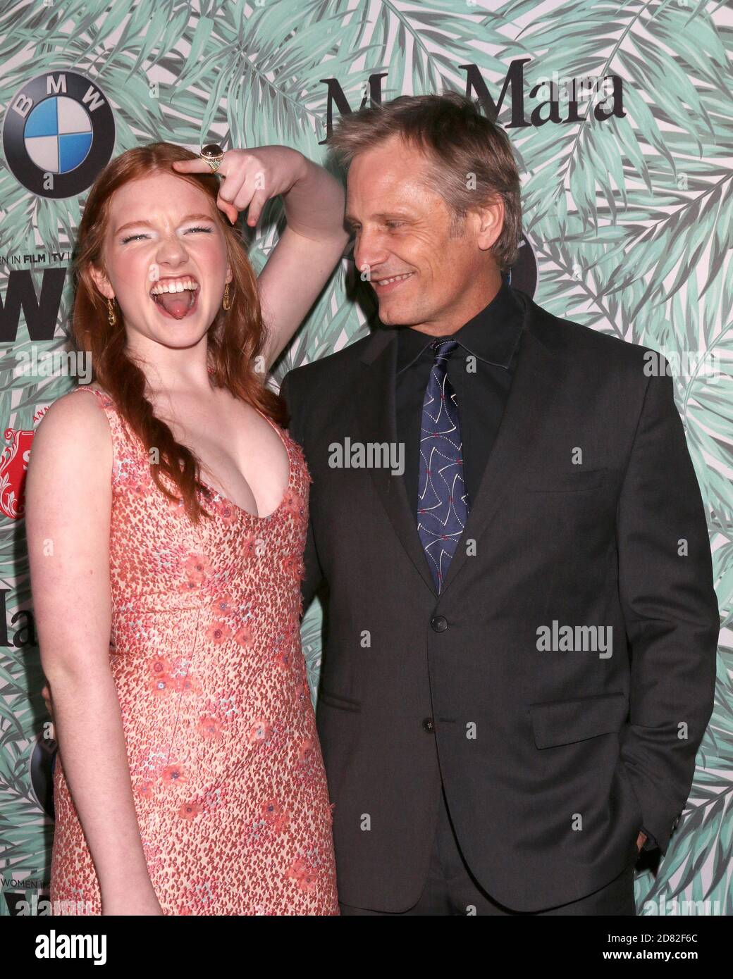 LOS ANGELES - FEB 24:  Annalise Basso, Viggo Mortensen at the 10th Annual Women in Film Pre-Oscar Cocktail Party at Nightingale Plaza on February 24, 2017 in Los Angeles, CA Stock Photo