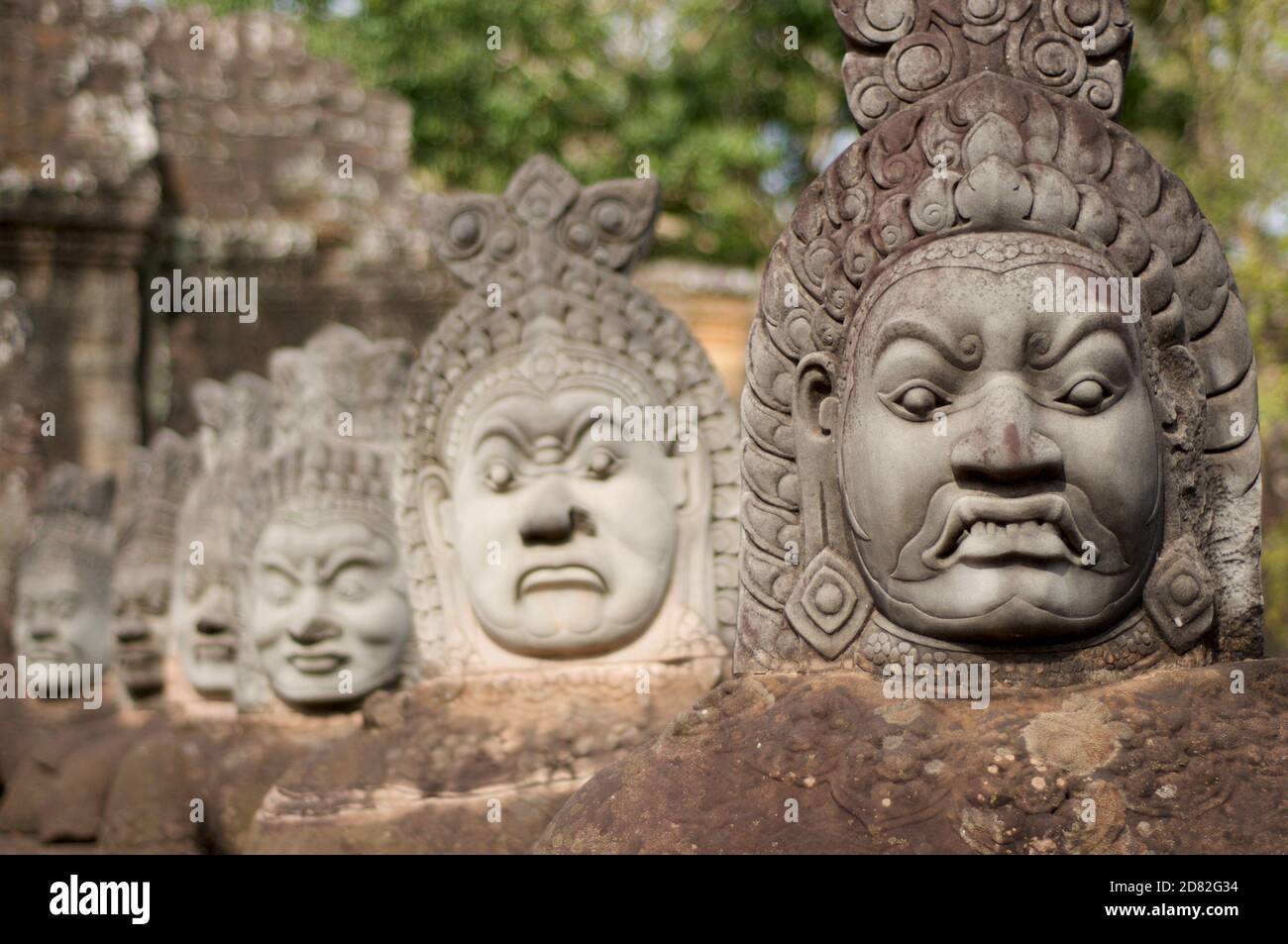 Close Up Of Asuras (Demons) Statues In A Row At The South Entrance Gate ...