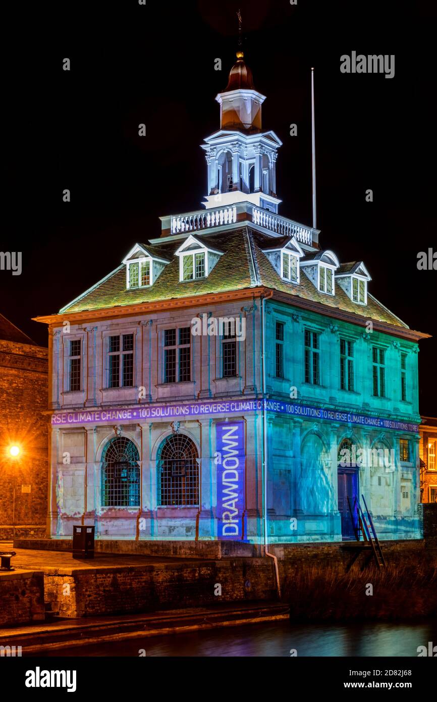Drawdown '100 solutions to reverse climate change' animation by Ben Sheppee projected onto the Customs House, King's Lynn. Stock Photo