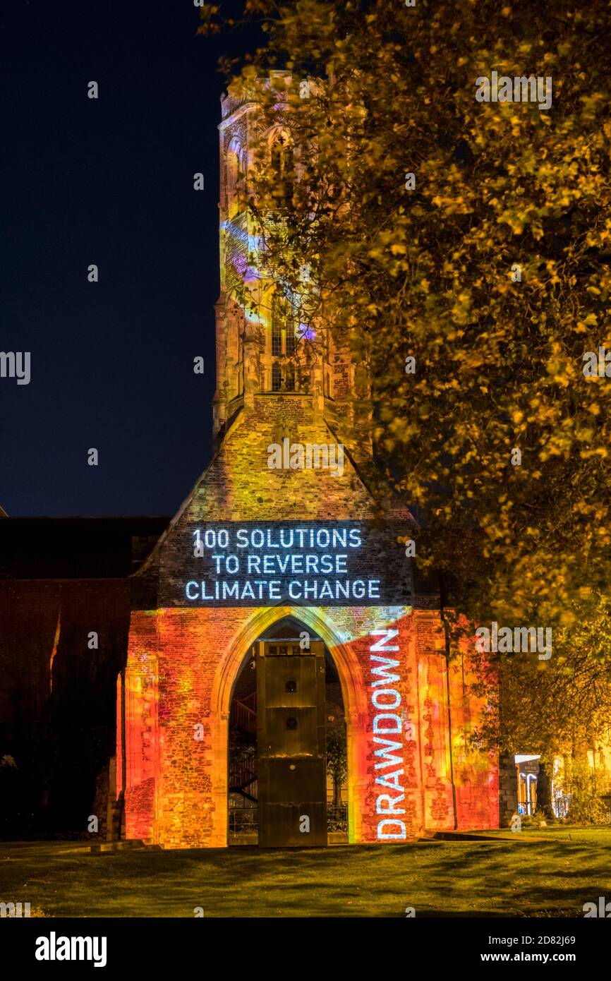 Drawdown '100 solutions to reverse climate change' animation by Ben Sheppee projected onto Greyfriars Tower, King's Lynn. Stock Photo