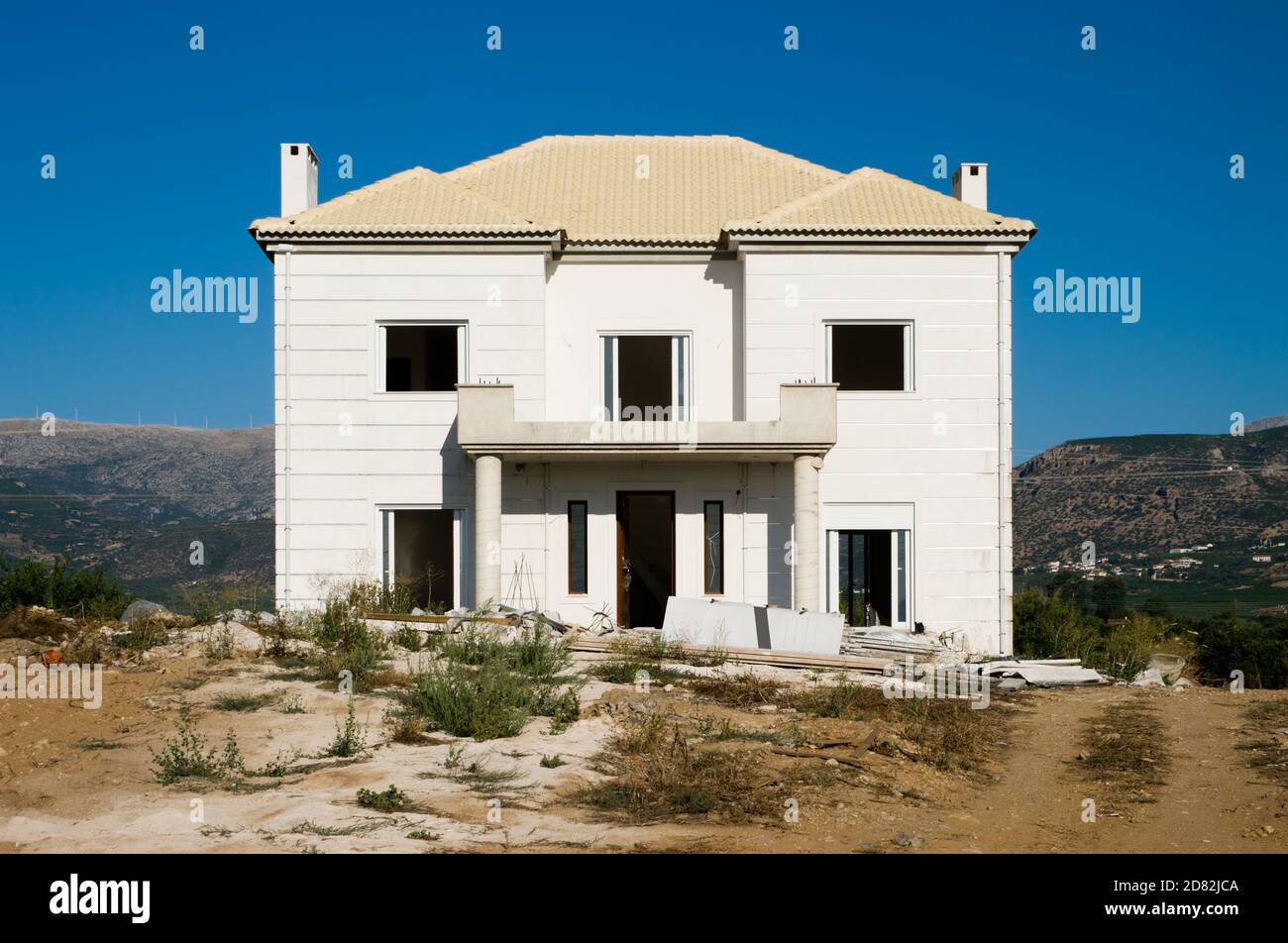 new house under construction without windows and door, Greece Stock Photo