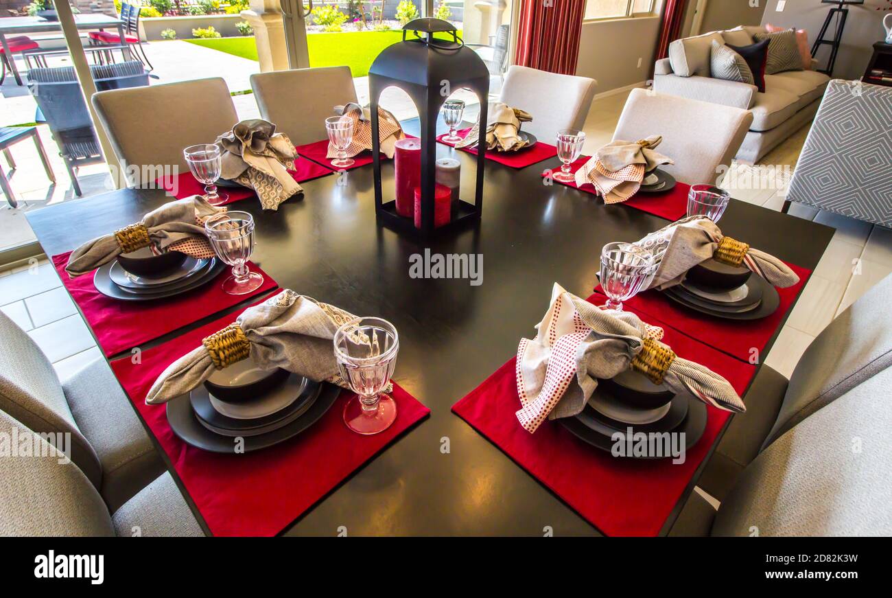 Dining Table With Eight Place Settings & Chairs Stock Photo
