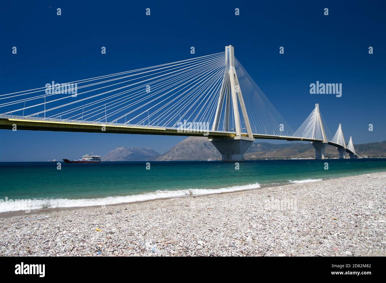 suspension bridge crossing Corinth Gulf strait, Greece.  Its official name is the Charilaos Trikoupis Bridge. The lead architect was Berdj Mikaelian Stock Photo