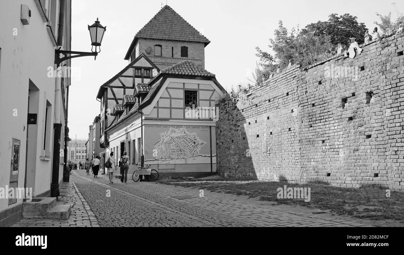 Black and white of the medieval old town of Torun, Poland on July 16, 2015.  The old town was a small historic trading city in the Middle Ages. Stock Photo