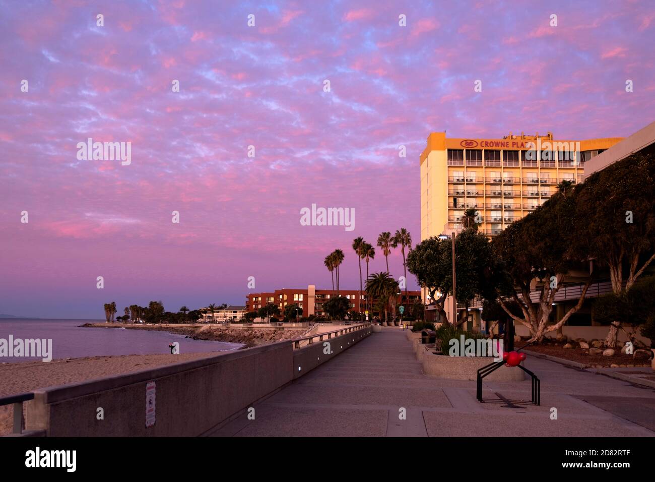 Pink sunrise on the boardwalk (promenade) of downtown Ventura facing the Pacific Stock Photo