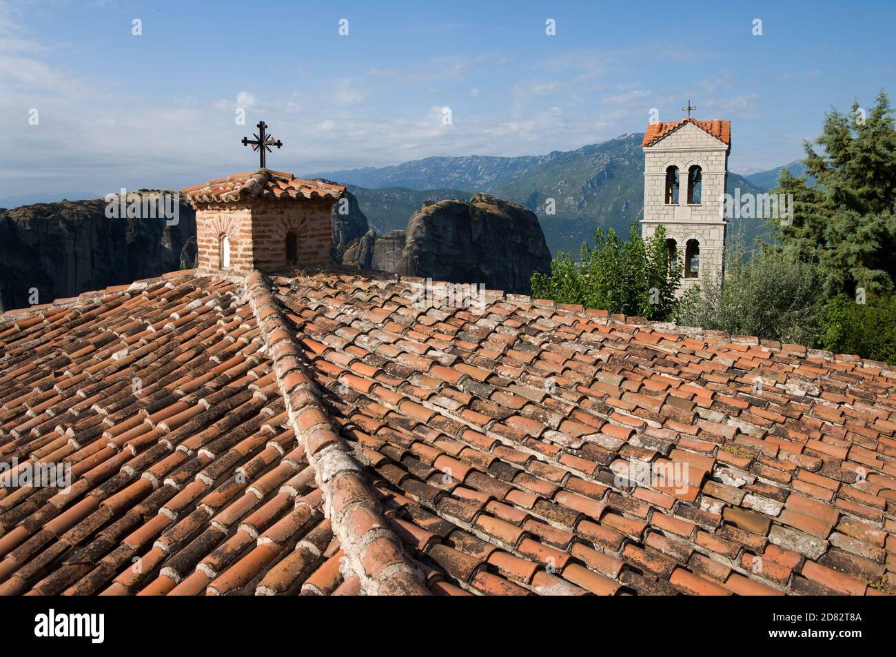 greek christian cross on rooftop of The Holy Monastery of Great Meteoron, Greece Stock Photo