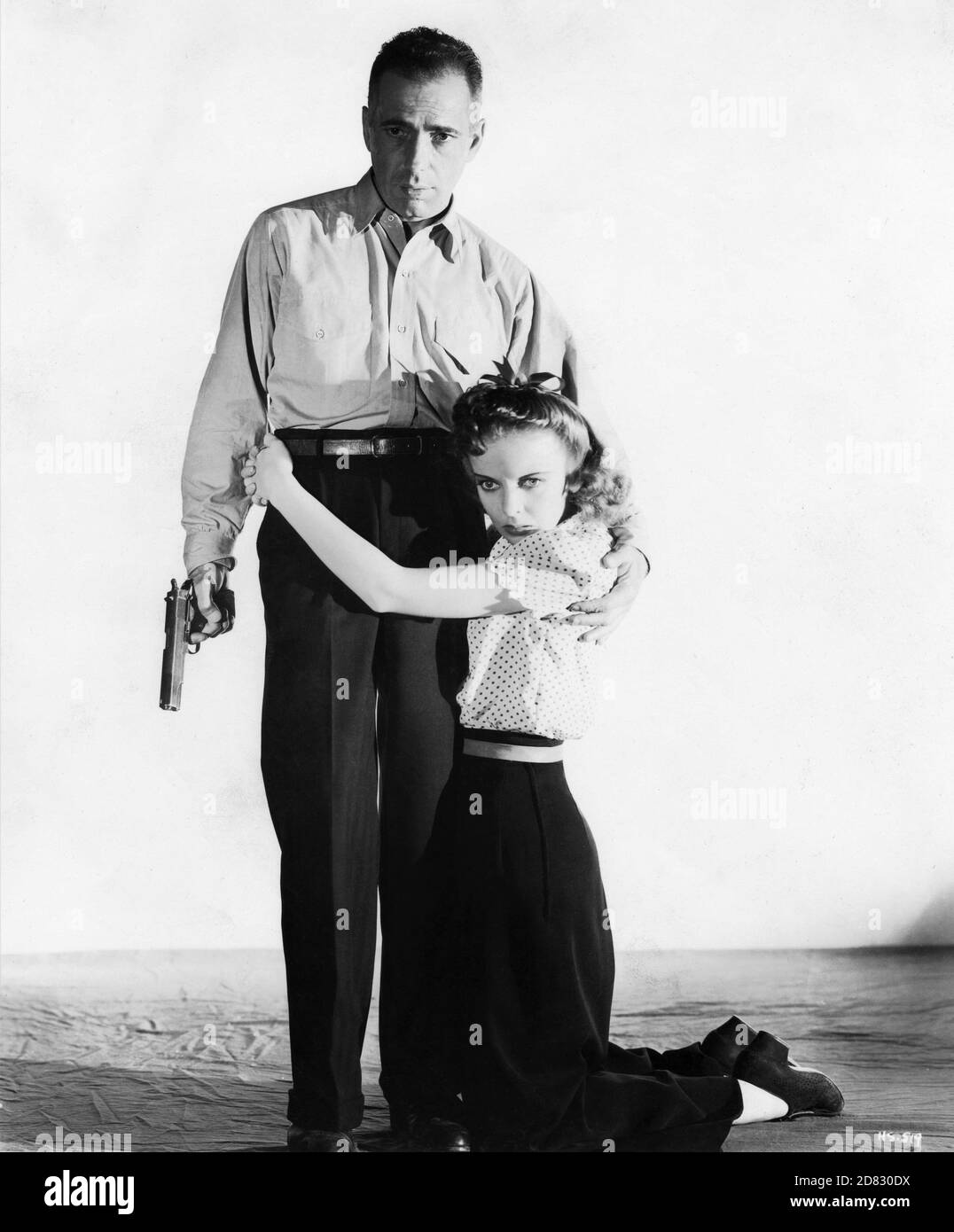 HUMPHREY BOGART and IDA LUPINO posed publicity portrait for HIGH SIERRA 1941 director RAOUL WALSH screenplay JOHN HUSTON and W.R.BURNETT novel W.R.BURNETT Warner Bros. Stock Photo