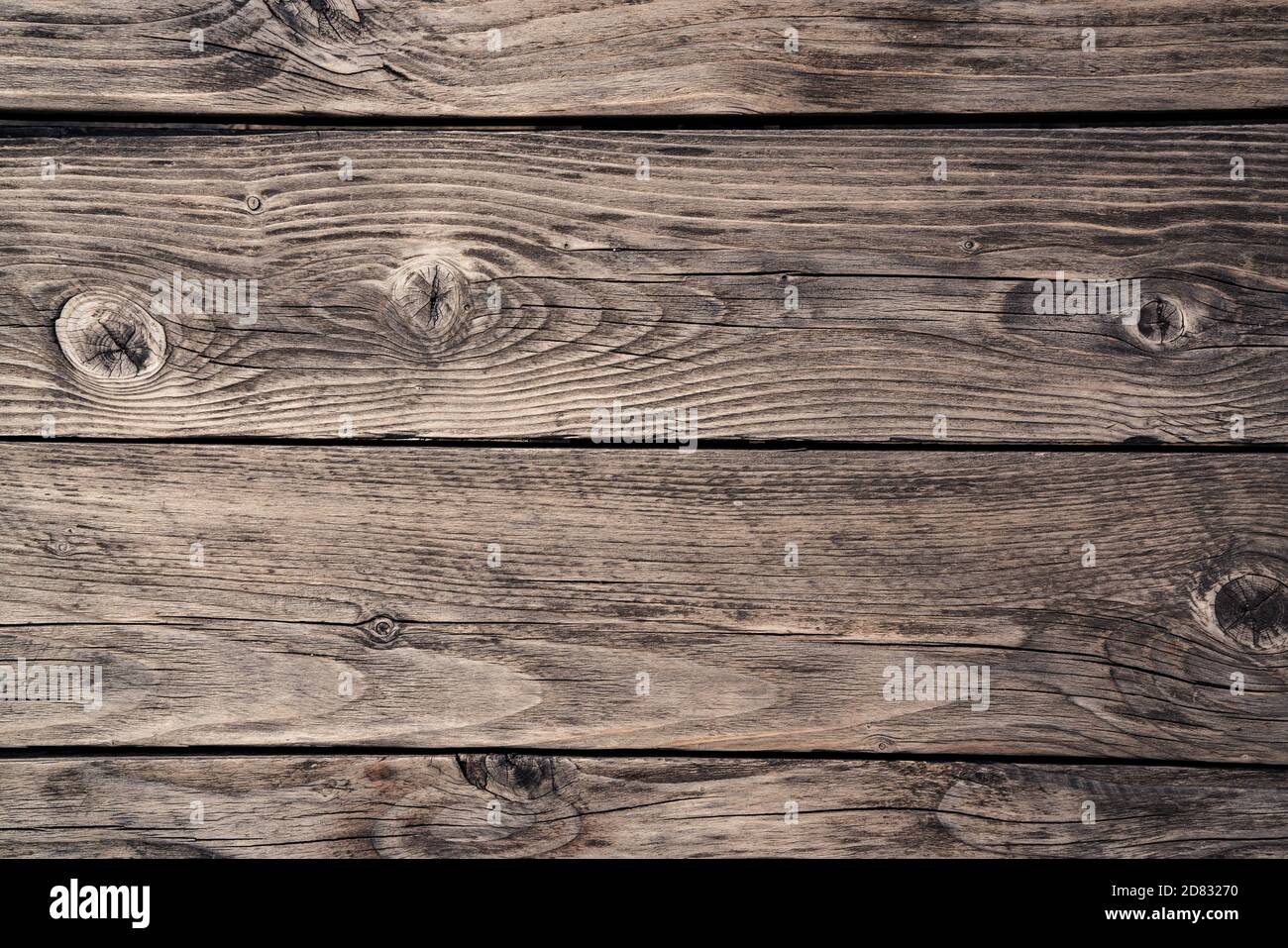 Milano -10/101/2020: wooden table background with knots, top view Stock Photo