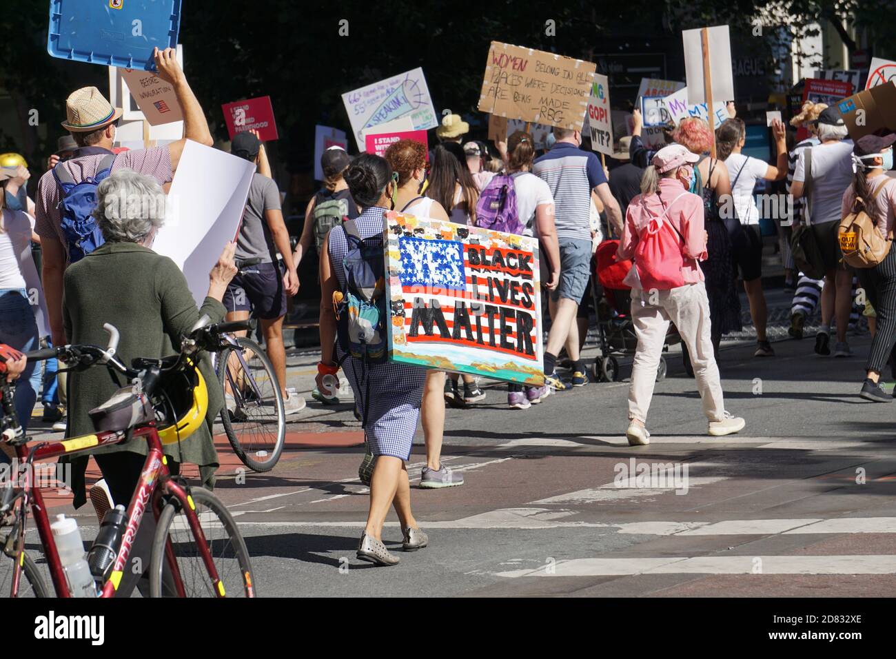 October 17, 2020. San Francisco Women's March before USA Presidential Election. Protesters holding signs. Stock Photo