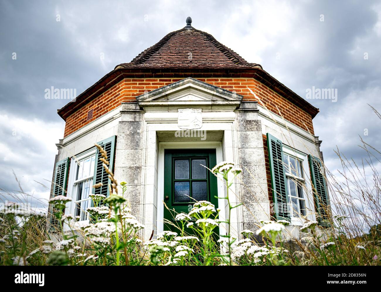 Windsor, United Kingdom - 28 July 2020: One of the Pair of Lutyens Kiosks on the Runnymede meadow, wide angle front view of historic building Stock Photo