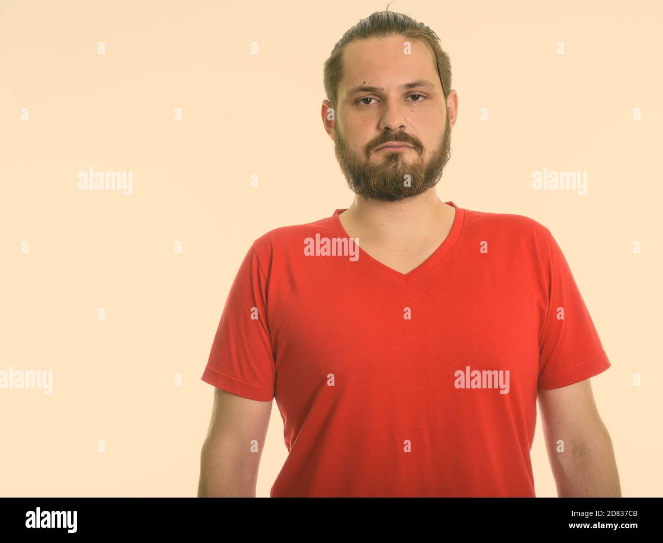 Portrait of young bearded man hi-res stock photography and images - Alamy