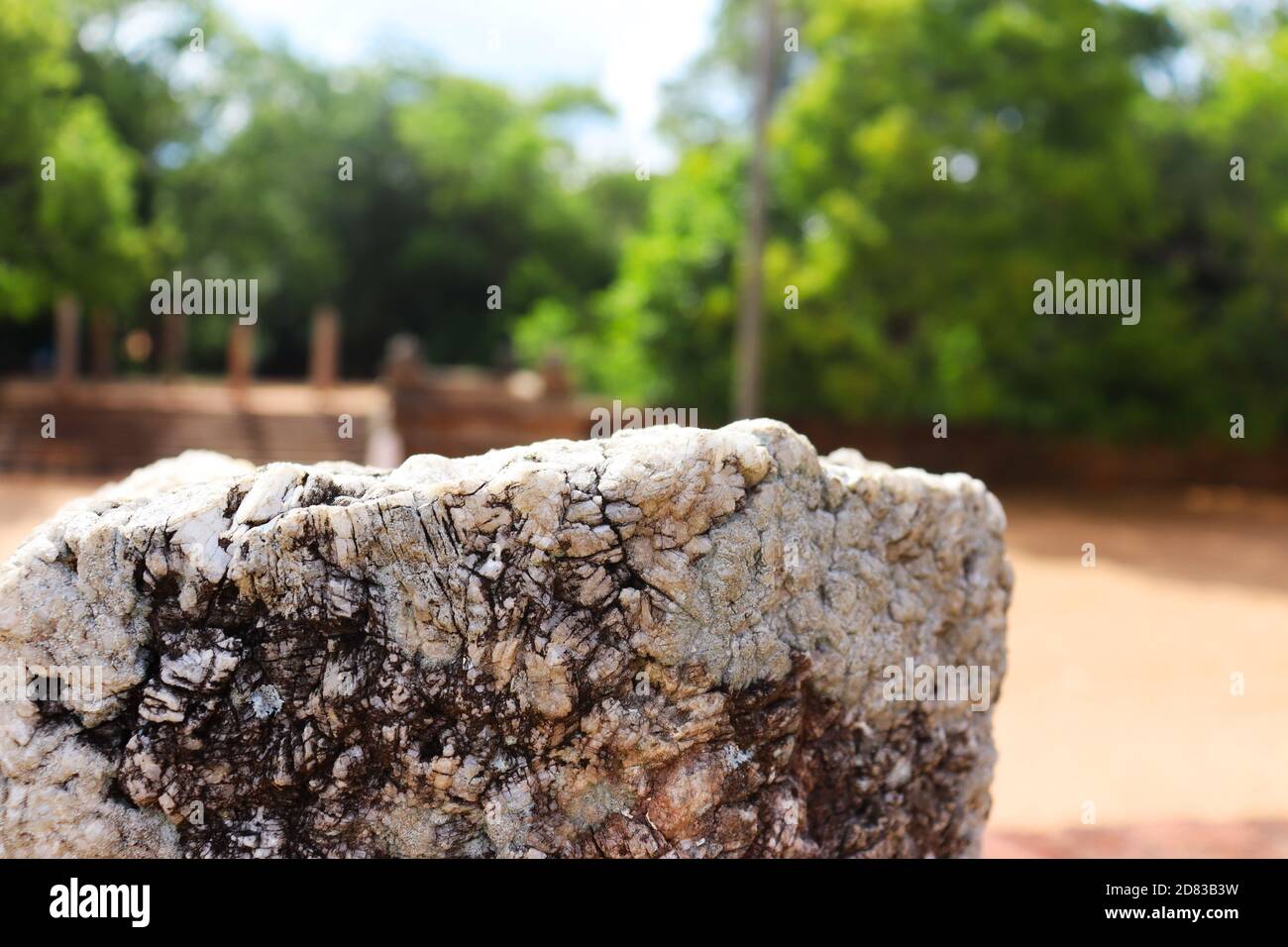 a picture of a stone pillar with a beautiful background Stock Photo