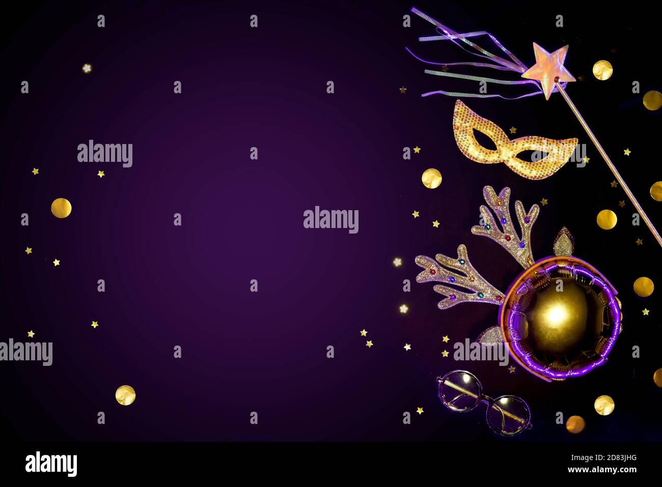 Gold glittering Masquerade accessories on a black background with