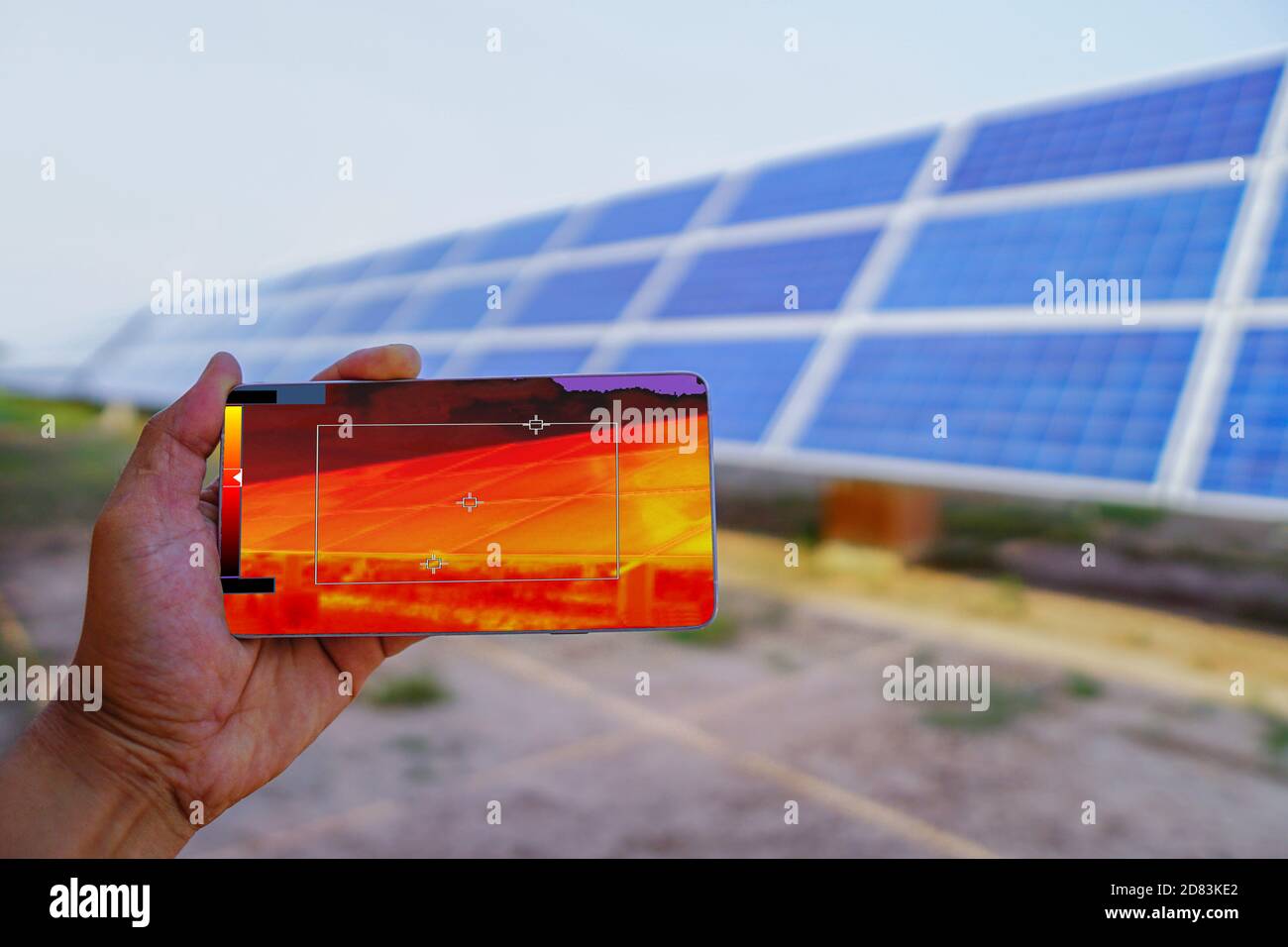 New technology for the future(thermal image camera by mobile phone), Industrial equipment used for checking the internal temperature of the machine fo Stock Photo