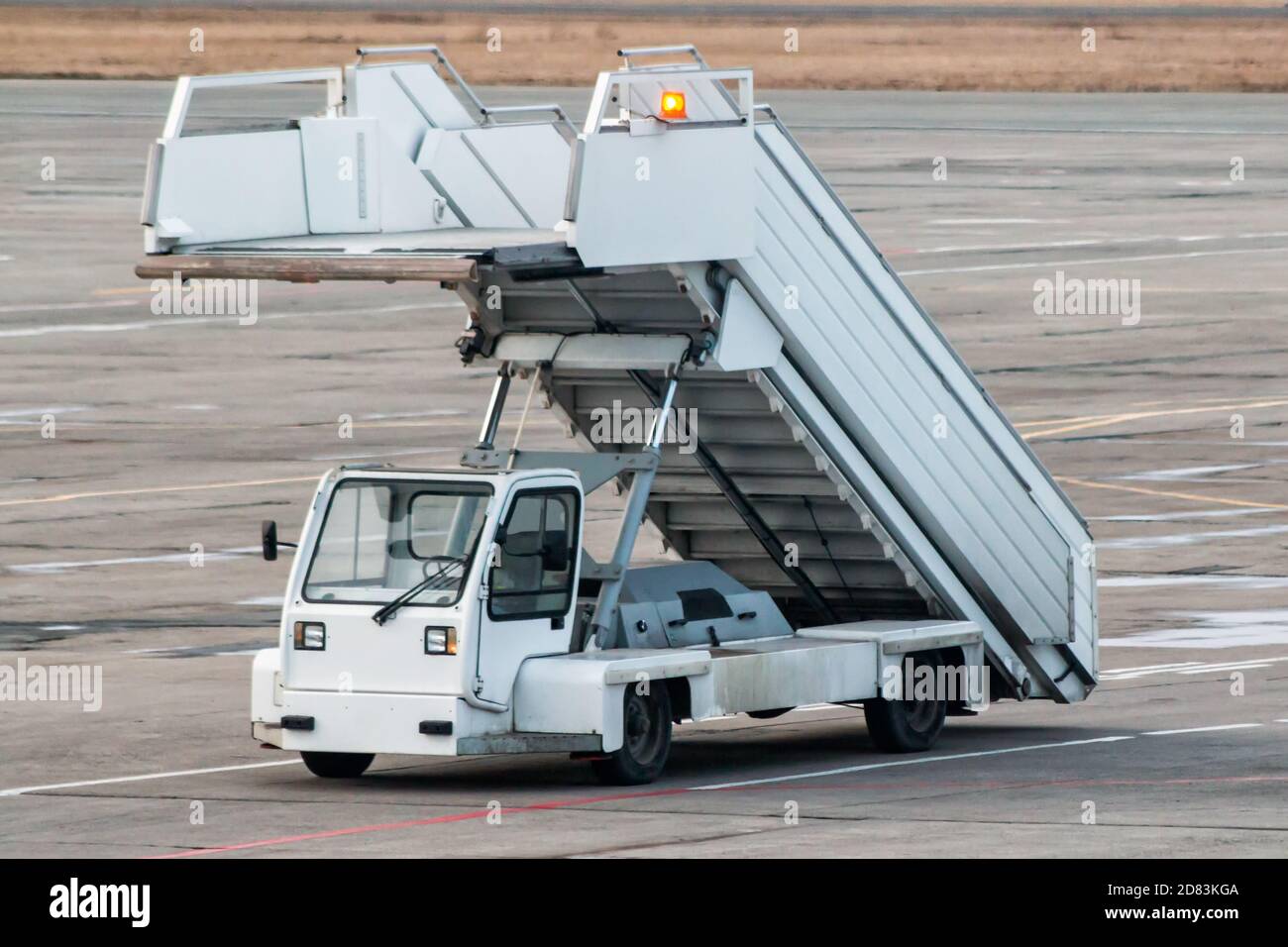 Passenger boarding steps at the airport apron Stock Photo Alamy