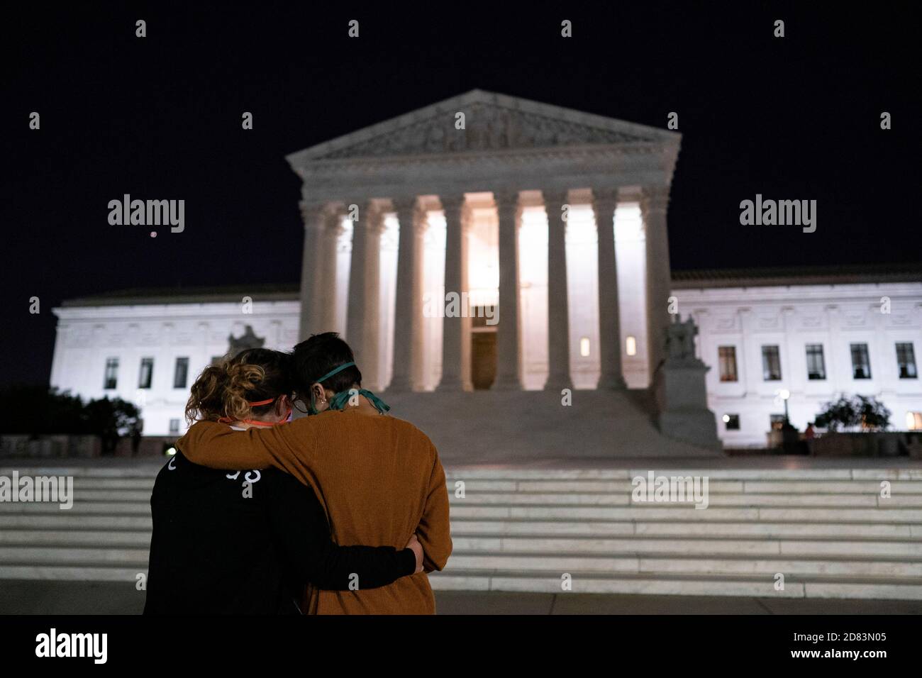 Mourners gather on the steps of the Supreme Court after the passing of US Supreme Court Justice Ruth Bader Ginsburg, in Washington, DC, on September 18, 2020. - Progressive icon and doyenne of the US Supreme Court, Ruth Bader Ginsburg, has died at the age of 87 after a battle with pancreatic cancer, the court announced on September 18, 2020 Credit: Alex Edelman/The Photo Access Stock Photo