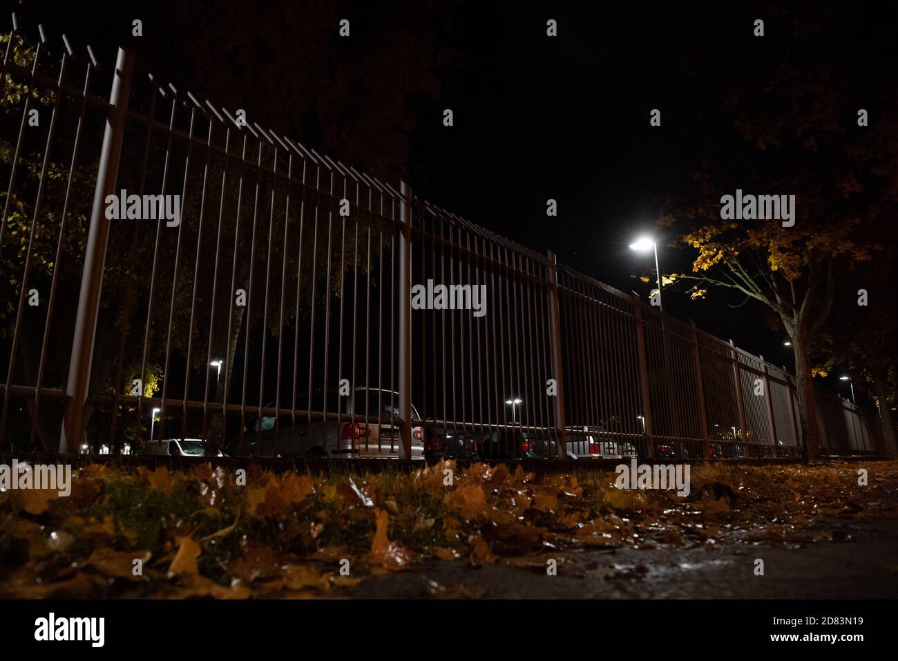Berlin, Germany. 27th Oct, 2020. Vehicles are parked behind a fence on police property. Eight cars caught fire during the night on a police area in Berlin-Biesdorf. Credit: Paul Zinken/dpa-Zentralbild/dpa/Alamy Live News Stock Photo