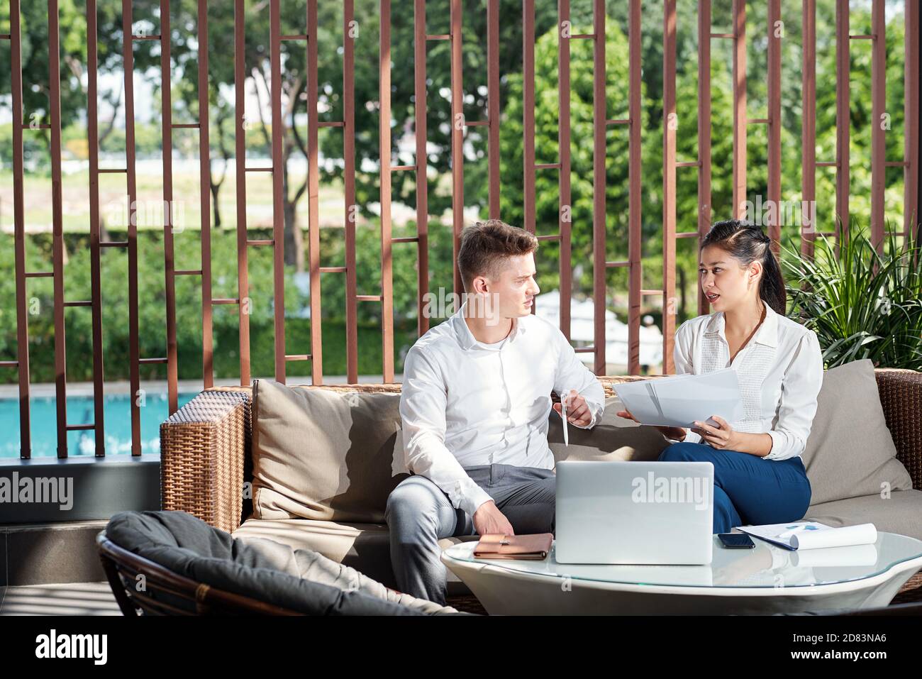 Business people discussing documents Stock Photo