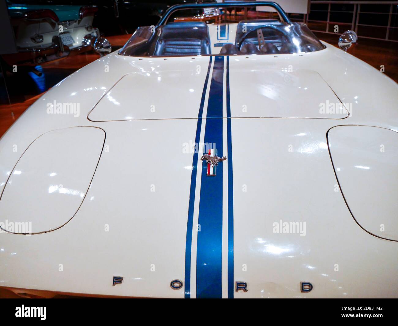 White 1962 Ford Mustang with blue racing stripes at the Henry Ford Museum Stock Photo