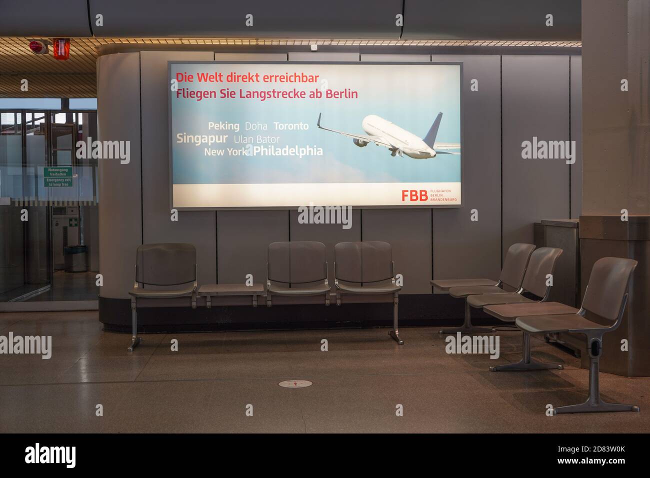 Berlin, Germany. 26th Oct, 2020. Advertising for long-haul or intercontinental flights can be seen at Tegel Airport. Scheduled flight operations in Tegel will cease on 7 November 2020. Terminal 1 of Berlin Brandenburg Airport will open on 31 October 2020. Credit: Jörg Carstensen/dpa/Alamy Live News Stock Photo