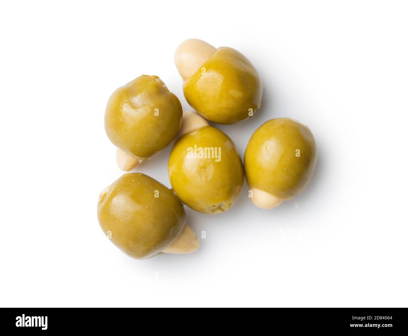 Pitted green olives stuffed with almonds isolated on white background