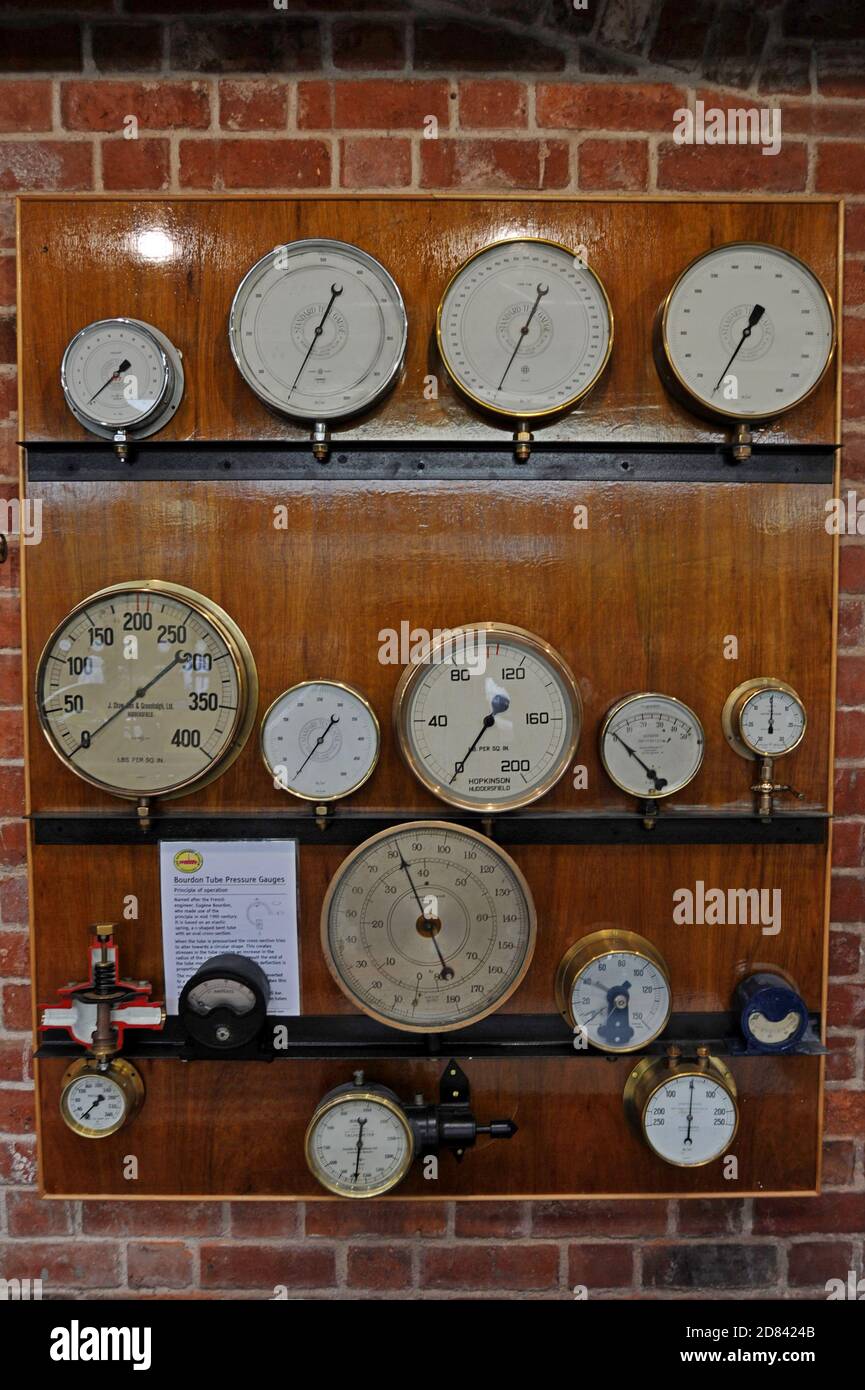 A display of historic steam engine gauges in display at Hereford