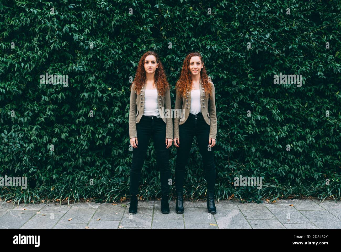 Two twins sisters spending time together Stock Photo Alamy